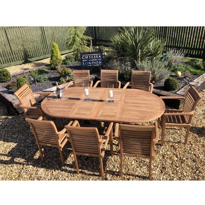 Teak extending table with 8 stacking chairs